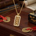 925 Sterling Silver Ornate Rectangular Medallion Necklace Featuring Interlocking Circular Motifs and Shimmering Accents