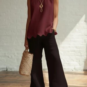 Crew-neck Sleeveless Shirt With A Wave Hem
