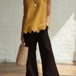 Crew-neck Sleeveless Shirt With A Wave Hem