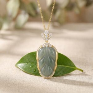 925 Sterling Silver Elegant Leaf-Shaped Green Jadeite Pendant Necklace with Sparkling Gemstone Accents