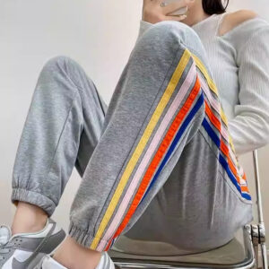 High-waisted Ankle-tied Joggers With A Gray-and-white Rainbow Stripe Design