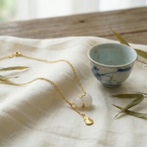 925 Sterling Silver Elegant White Hulu Pendant Necklace with Artistic Leaf Accent