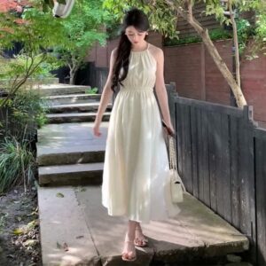 Waist-Cinching Sleeveless Halterneck Dress For A Vacation Vibe Slimming And Chic