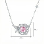 Silver necklace with a pink gemstone centerpiece set in a diamond-studded floral pendant (2.0 cm wide, 1.3 cm tall). It features petal-like diamonds surrounding a pink gem on a delicate chain.