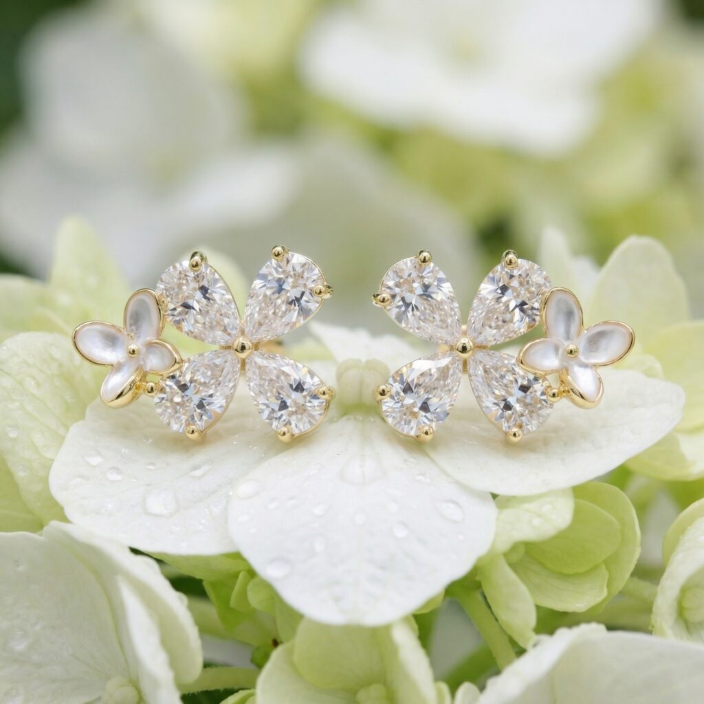 925 Sterling Silver Elegant Butterfly Blossom Stud Earrings with Pear Cut Crystals and Mother of Pearl Accents