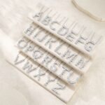 A Luxurious And Fashionable Light Luxury Trend Jewelry Silver Necklace Pendant Featuring The Letter O Set With Top-quality Moissanite, Made Of S925 Silver Electroplated With Platinum.