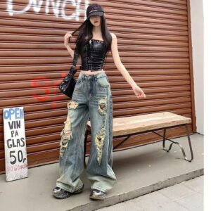 Ripped Denim Jeans With A Vintage American Design Aesthetic