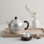 Pure 999 Fine Silver Handcrafted Fine Silver Teapot with Intricate Floral Engravings and Rosewood Handle - Handicraft