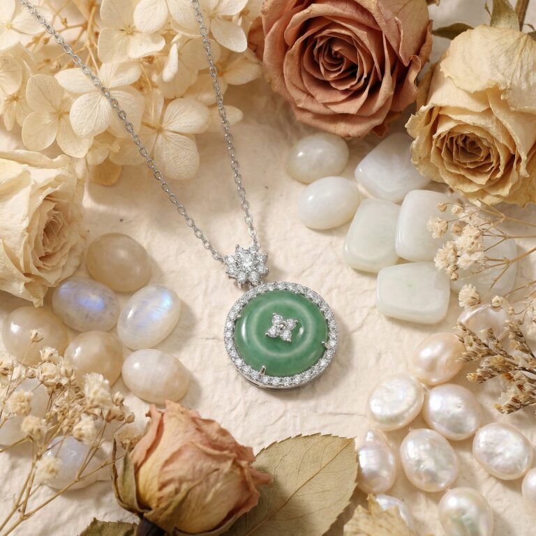 925 Sterling Silver Elegant Circular Green Jadeite Pendant Necklace with Sparkling CZ Accents and Floral Bail.