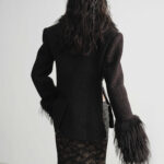 Women In Woolen Coat With Inclined Placket