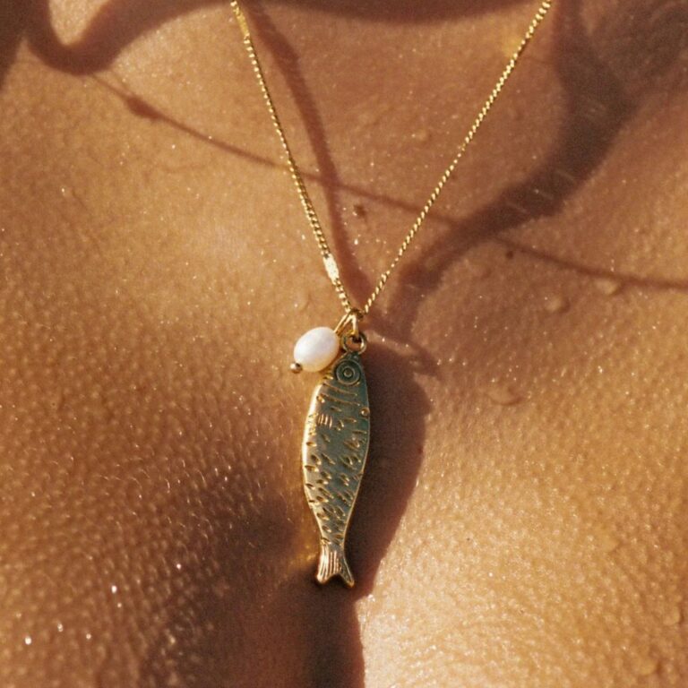 Stainless Steel Necklace With An 18K Gold plated Baroque Freshwater Pearl Pendant In The Shape Of A Small Fish